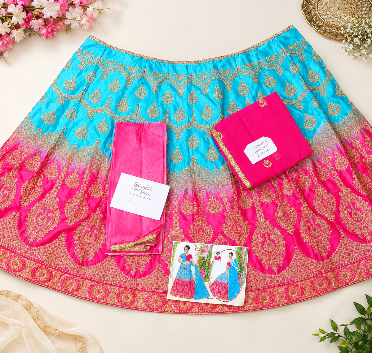 Elegant silk lehanga adorned with delicate net embroidery, perfect for special occasions