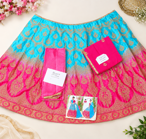 Elegant silk lehanga adorned with delicate net embroidery, perfect for special occasions
