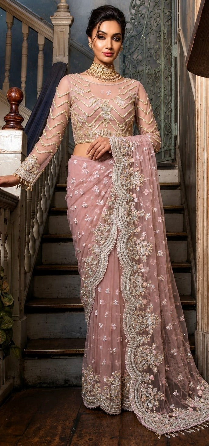 Exquisite net saree adorned with intricate embroidery featuring sequins, stones 5034