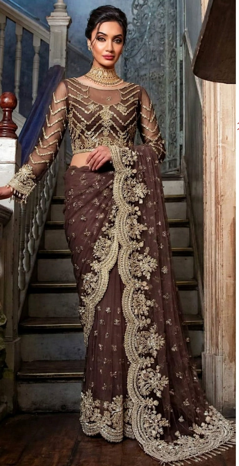 Exquisite net saree adorned with intricate embroidery featuring sequins, stones 5034