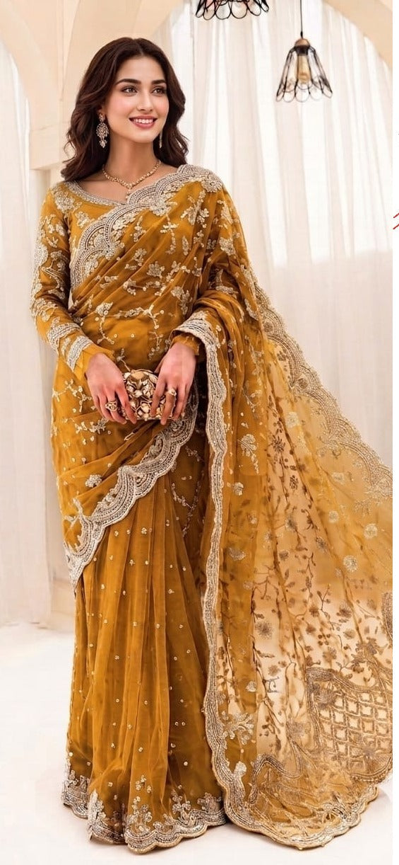 Exquisite net saree adorned with intricate embroidery featuring sequins, stones, and pearls throughout