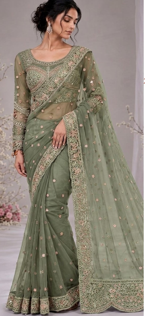 Elegant net saree crafted with intricate embroidery featuring sequins, stones 5038