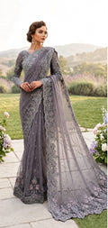 Elegant net saree adorned with intricate embroidery featuring sequins, stones 5040